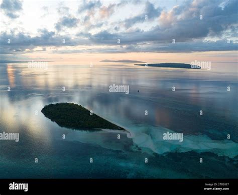 Sunrise Illuminates The Remote Island Of Koon Near Seram Indonesia