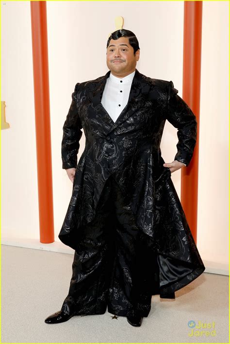 Full Sized Photo Of Harvey Guillen Twirls On Oscars 2023 Red Carpet 05