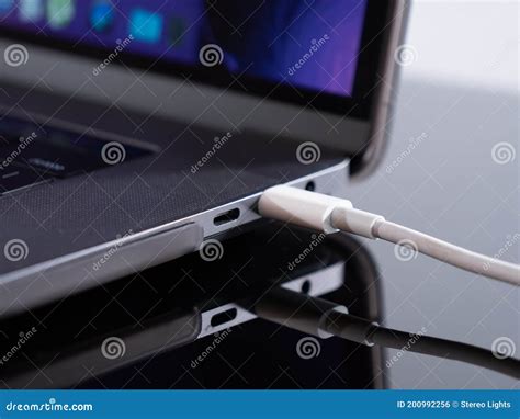 Usb Type C Cable Being Connected To The Laptop Computer Fast Charging