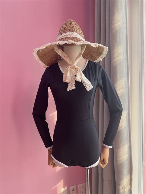 Bikini 1 mảnh Đồ bơi nữ liền mảnh CÀI KHÓA SAU khoét lưng màu đen viền trắng sporty nhiều kiểu