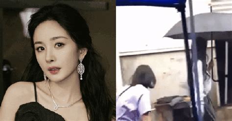 Dương Mịch vướng tranh cãi gay gắt khi lộ clip che ô 1 mình bỏ mặc nhân viên đầu trần đội mưa