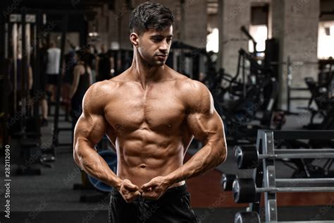 Muscular Man Workout In Gym Strong Male Naked Torso Abs Stock Photo Adobe Stock