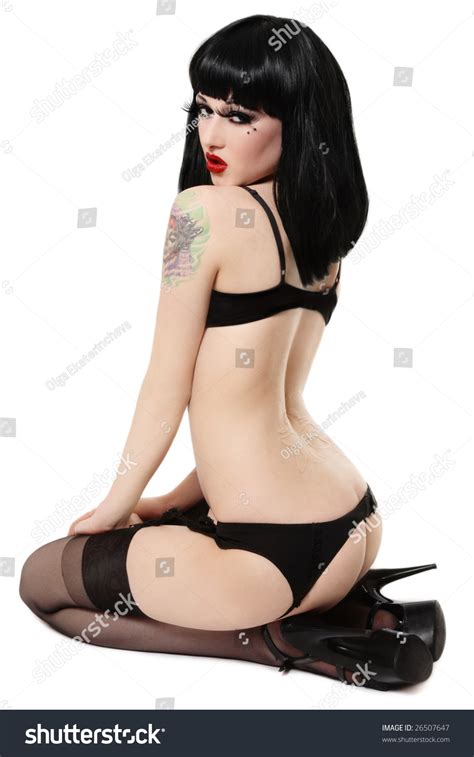 Sexy Brunette Garter Belt Stockings Stilettos Stock Photo