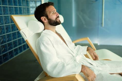 Handsome Man Relaxing In Chair At Spa Center Stock Image Image Of Horizontal Recreation 96044977