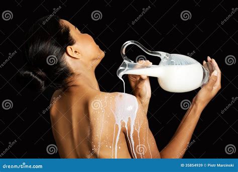 Beautiful Naked Woman Is Pouring Milk On Her Back Stock Image Image Of Freshness Natural