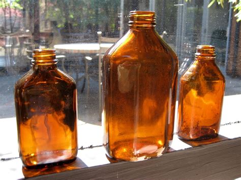 Lot Of 3 Amber Colored Vintage Glass Bottles Amber034