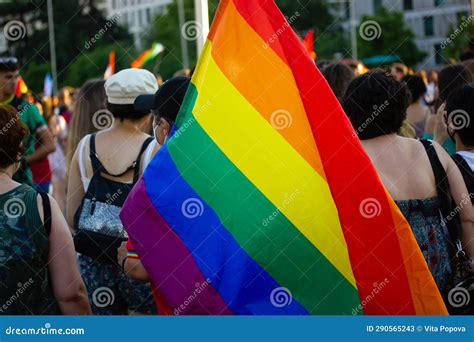 A Rainbow Flag In Hand An Activist At Pride Month March Crowd Gay Pride Parade Editorial Stock