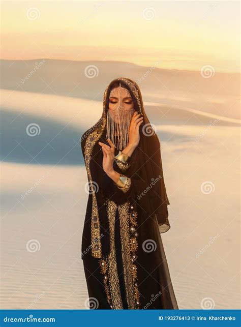 Beautiful Mysterious Arab Woman Queen in Black, Muslim Dress. Head with