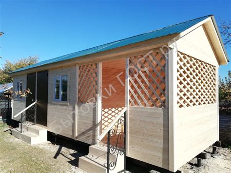 Бытовка дачная 9х3м двухкомнатная с верандой и сборкой на участке