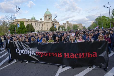 Thousands March In Silence In Serbia After Mass Shootings