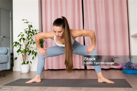 Athletic Woman Doing Sumo Squat With Widefooted Deep Female Sitting Down Pose Malasana Goddess