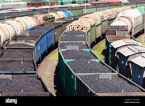 rail cars loaded with coal, a train transports coal Stock Photo - Alamy