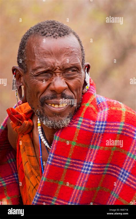 Portrait Of A Maasai Man Wearing Traditional Dress Massai Mara Kenya