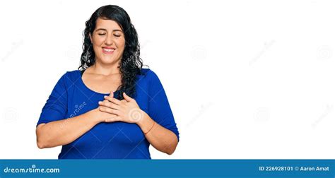 Plus Size Brunette Woman Wearing Casual Clothes Smiling With Hands On Chest With Closed Eyes And