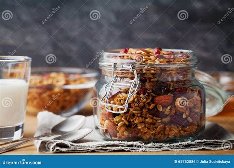 Homemade Granola In Jar On Rustic Table Healthy Breakfast Of Oatmeal