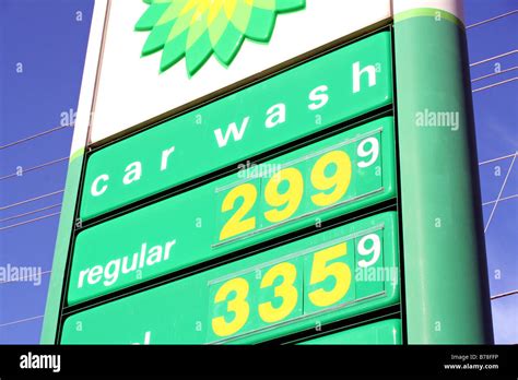 gas two ninety nine per gallon sign Stock Photo - Alamy