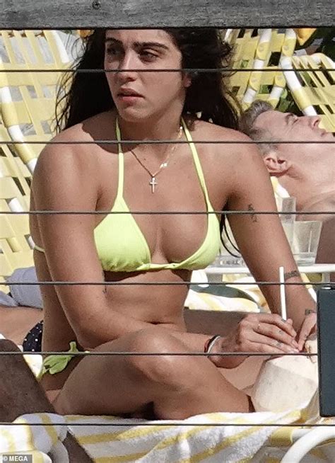 Madonna S Daughter Lourdes Leon Makes A Splash In Neon Yellow Bikini