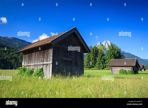 Wooden Barns With The Waxenstein Mountain In The Background Garmisch