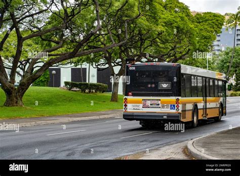 A Honolulu City Bus Thebus Displays A Shaka After Merging To Alapai