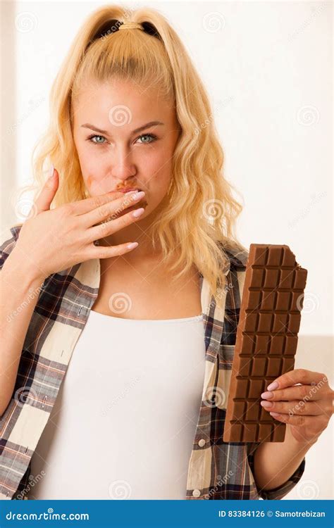 Beautiful Blonde Woman Eats A Big Chocolate Stock Photo Image Of Looking Healthy