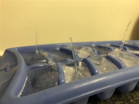 Why are these ice cubes forming like this? It is distilled water if that matters. : r/Whatisthis
