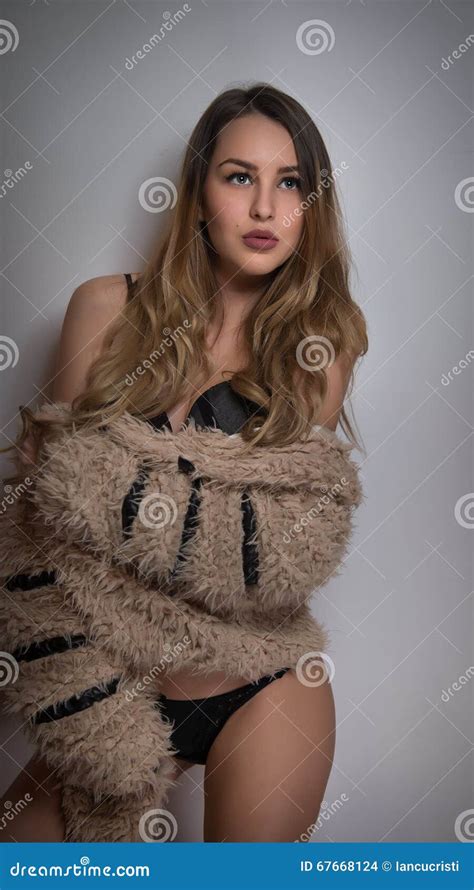 Attractive Blonde In Black Lingerie Posing Provocatively Indoor Portrait Of Sensual Woman