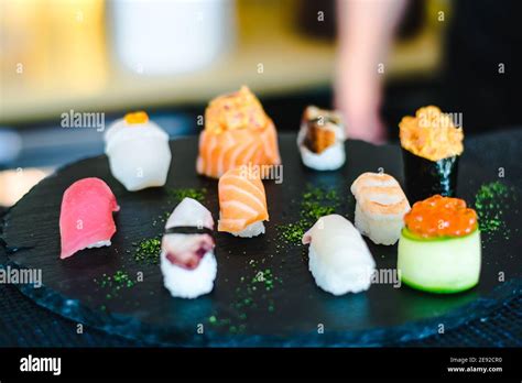 maki  nigiri sushi variety  salmon shrimp avocado  tuna