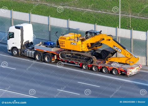 Excavator JCB Truck Trailer Loaded Onto Cargo Transport on a Trailer ...