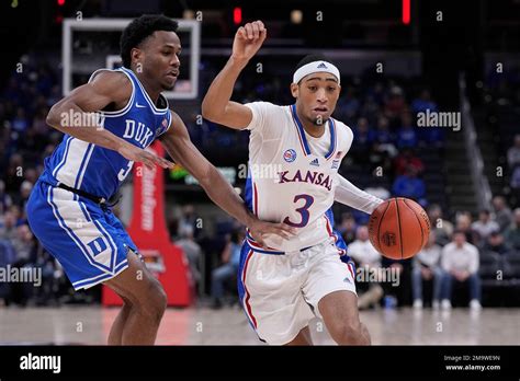 Kansas Guard Dajuan Harris Jr Right Drives Around Duke Guard Jeremy