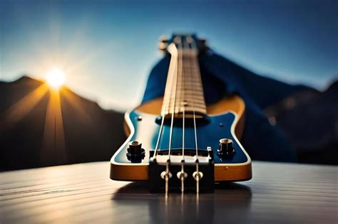 Premium Photo | A guitar is on a table with the sun behind it.