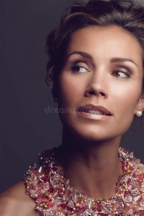 Rich Woman Thinking And Vintage Necklace On Studio Background For