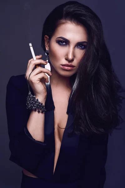 Elegant Hot Brunette Woman Smoking A Cigarette Stock Photo Alexvolot
