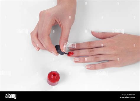 Applying Nail Polish Stock Photo Alamy