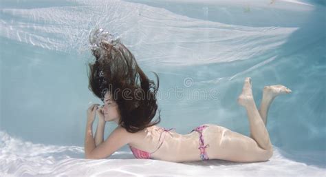 Woman Wearing A Bikini Swimsuit Holding Her Breathe Underwater Stock Photo Image Of Breathe