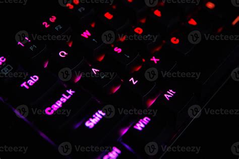 Gaming rgb keyboard on dark background 21903507 Stock Photo at Vecteezy