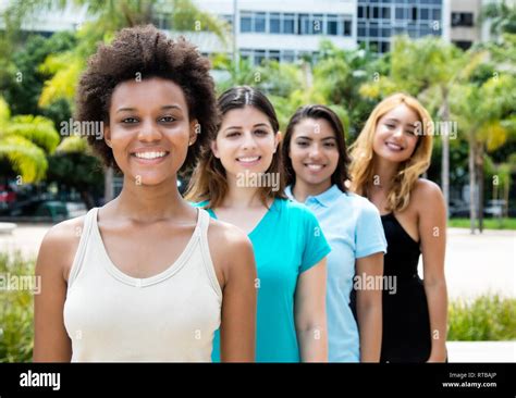 African And American And Caucasian And Hispanic Young Adults In A Row