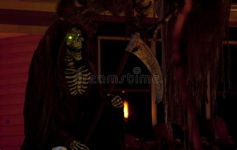 Grim Reaper with Glowing Green Eyes Stock Photo - Image of dead ...