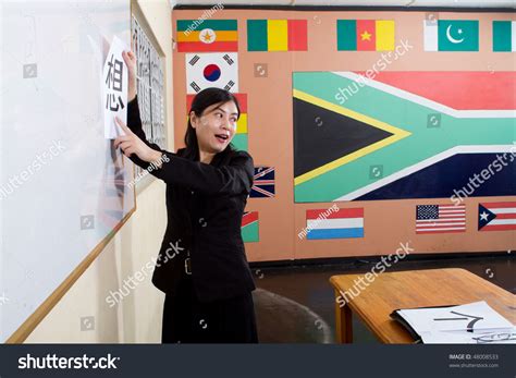 woman teaching chinese classroom background  stock photo