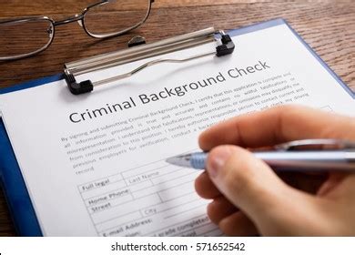 Closeup Person Hand Filling Criminal Background Stock Photo