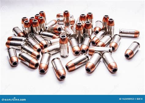 3 Bullets Upright On Table 22 Long Rifle Shotshell Ammunition