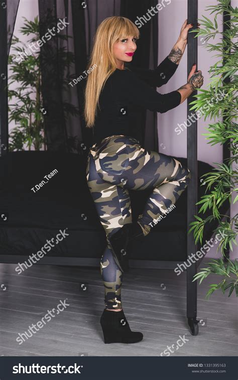 Sexy Mature Fit Athletic Woman Demonstrates Stock Photo