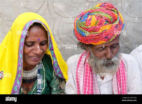 Indian Male And A Female Wearing Traditional Indian Clothes At A