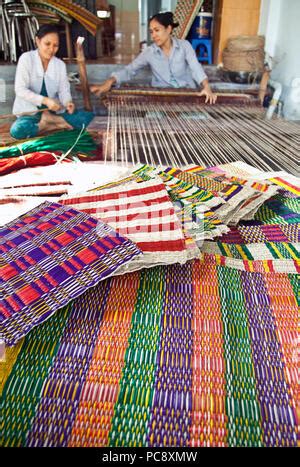 Vietnamese Women Weaving Mats At A Craft Factory In Hoi An Vietnam