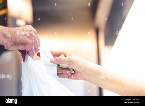 People Paying With Cash In A Market Stock Photo Alamy