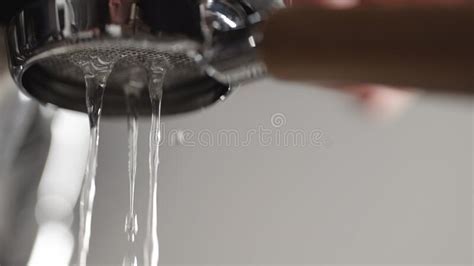 Low Angle Shot Of Rinsing Water From Naked Portafilter Stock Image Image Of Bottomless Long