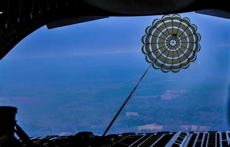 A Parachute Pulls A Pallet Out Of The Rear Of C 17 Nara And Dvids