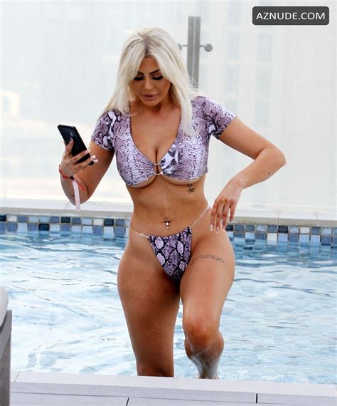 Chloe Ferry Hot In A Purple Snakeskin Bikini While Enjoying Some Downtime By The Pool On Holiday