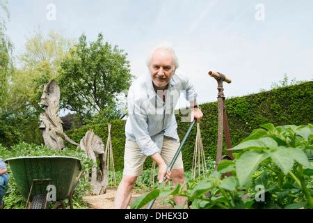 Nude Man Gardening Stock Photo Alamy