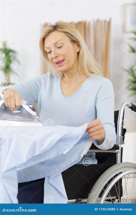 Mature Woman Irons Clothes Stock Photo Image Of Nurturing