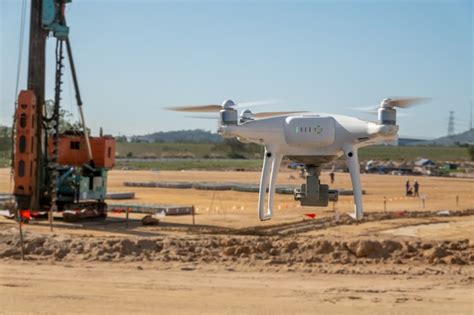 Premium Photo | A drone survey at construction site